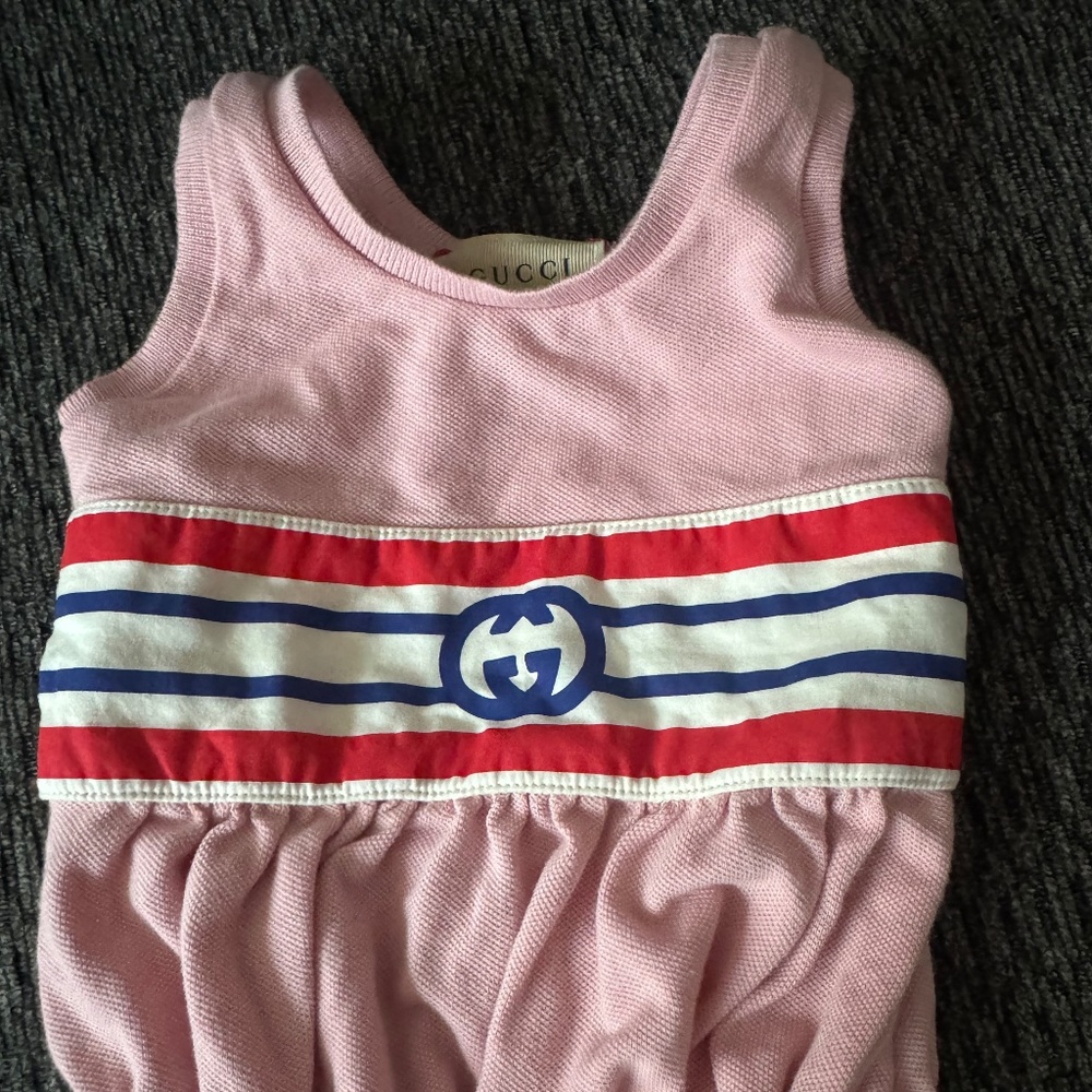 Baby pink and white interlocking Gucci bodysuit